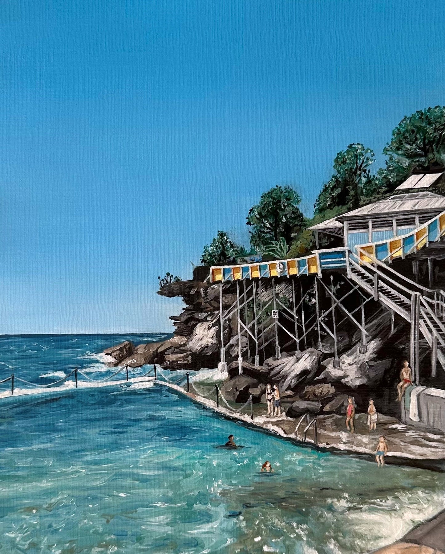 A fine art print of an oil painting depicting Wylie's Baths and Coogee Beach, featuring clear blue sky, ocean, and a man-made bath structure with people in the water. One of the most iconic beaches in Sydney.